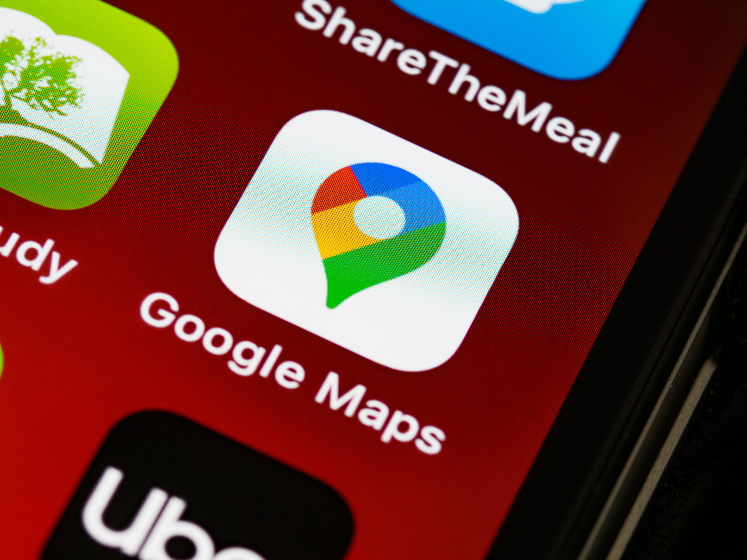 About Detailed view of Google Maps app icon on a smartphone screen, showcasing digital navigation technology.