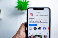 About Close-up of a smartphone displaying the Instagram app, emphasizing social media connection.